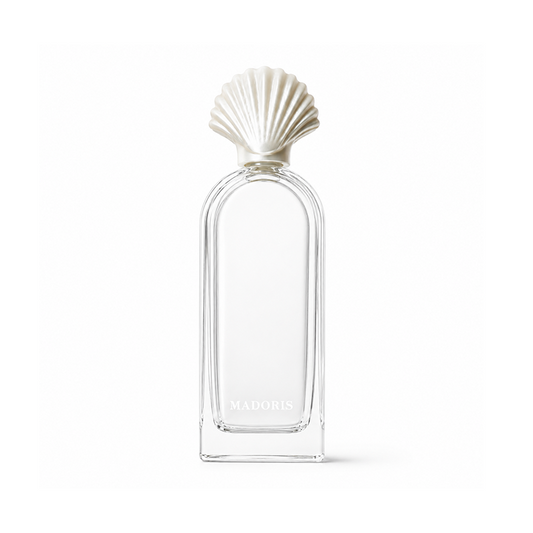 MADORIS Cashmere Amber reed diffuser with pearl-white shell cap and clear glass bottle