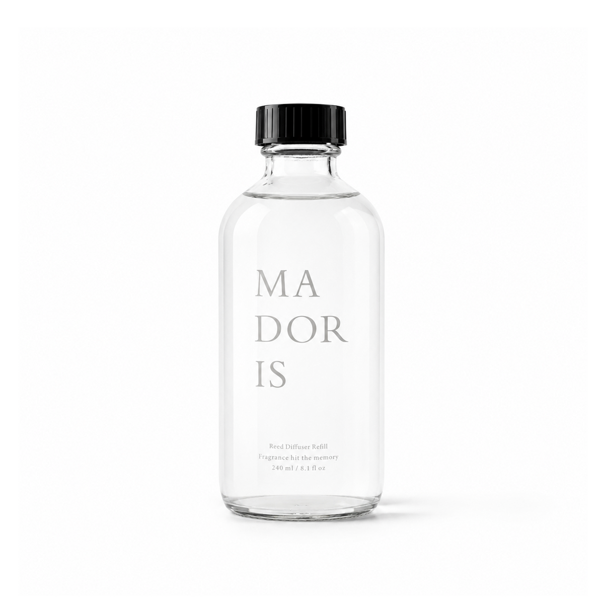 MADORIS Golden Hour 240ml fragrance refill in a clear bottle with black cap