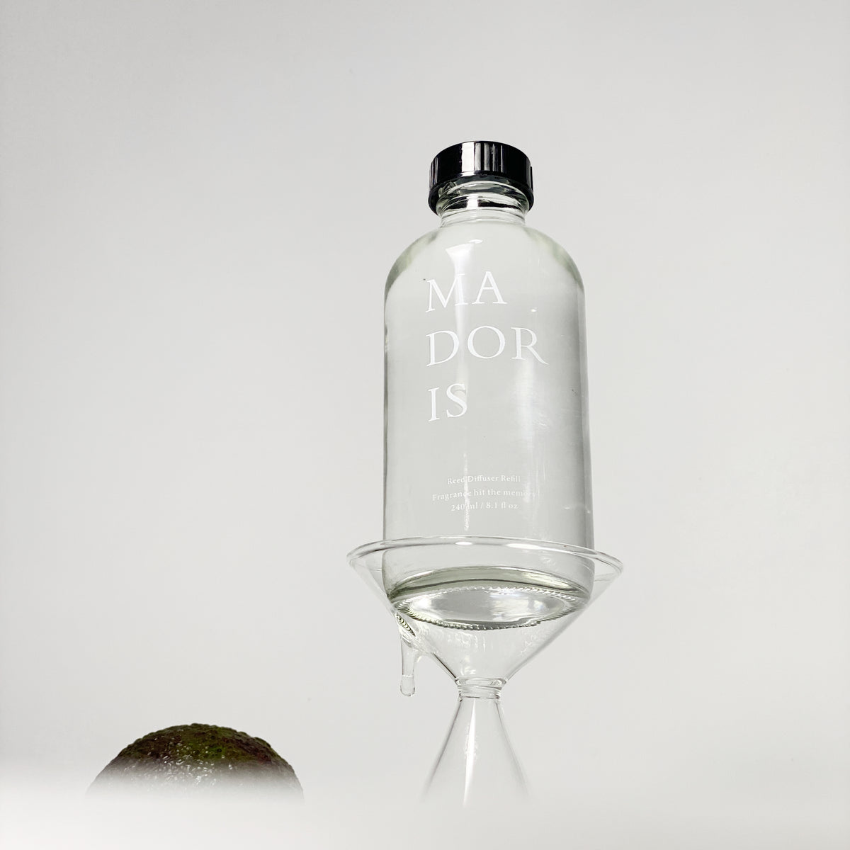 MADORIS Golden Hour 240ml fragrance refill displayed in a clean minimal still life