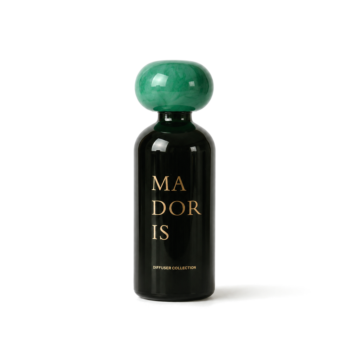 MADORIS Jade Mist reed diffuser with green sculptural cap and black glass bottle