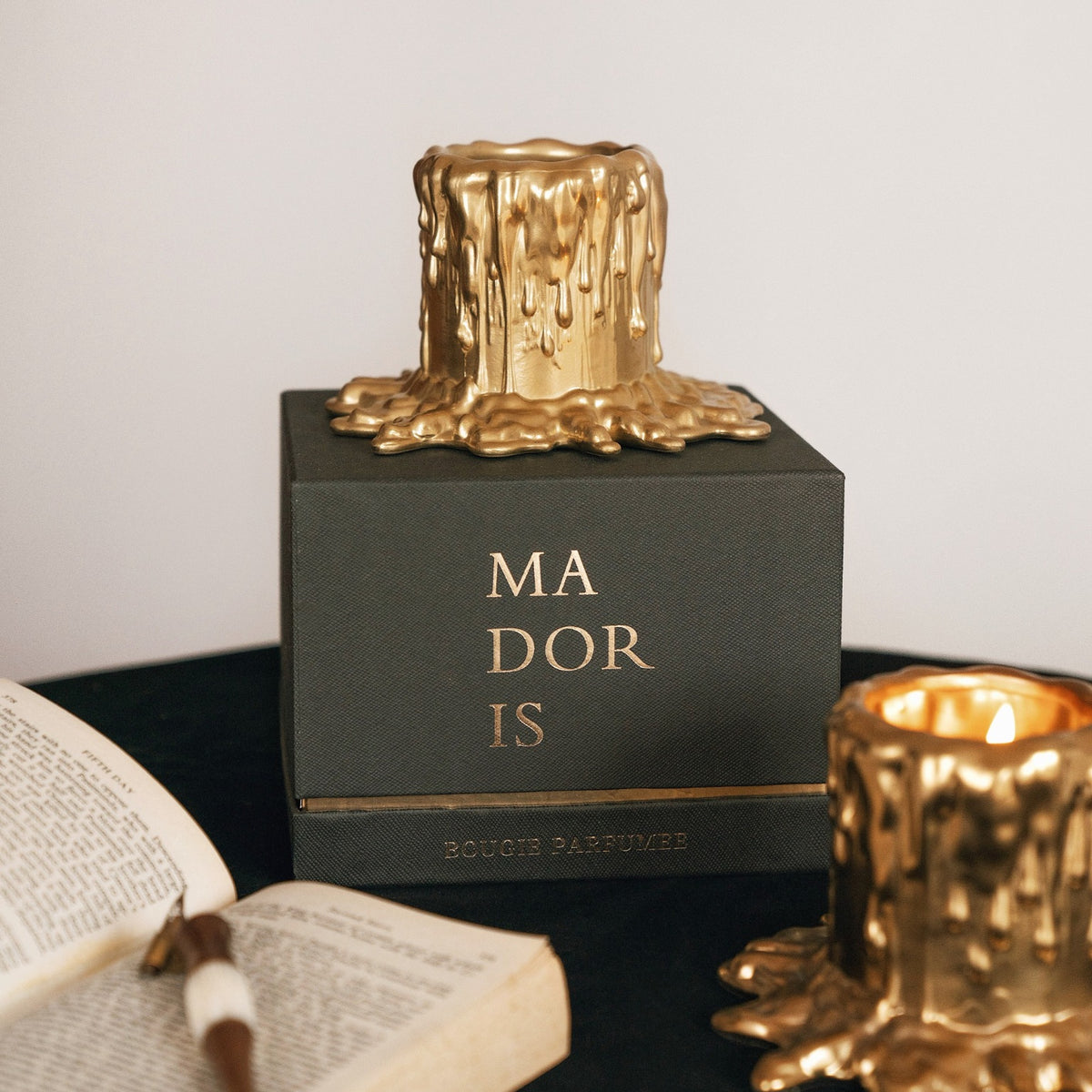 MADORIS Molten Bloom scented candle with black and gold signature gift box